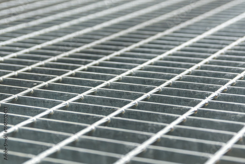 Metal Grating Grid Closeup. Steel Texture Pattern. Industrial Background Anti Slip Walkway