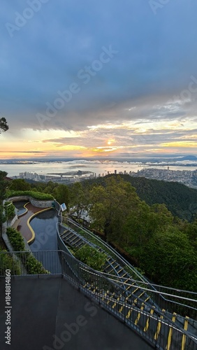Dramatic Sunrise View Over City Skyline and Harbor from a Mountain Top Observation Deck