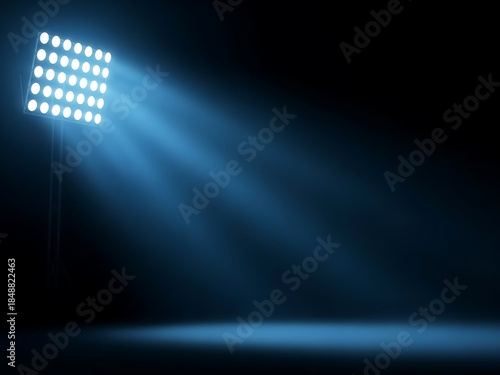 Spotlight Illuminating Dark Stage.