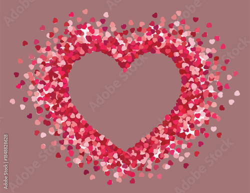Heart shaped frame of pink and red hearts on mauve background