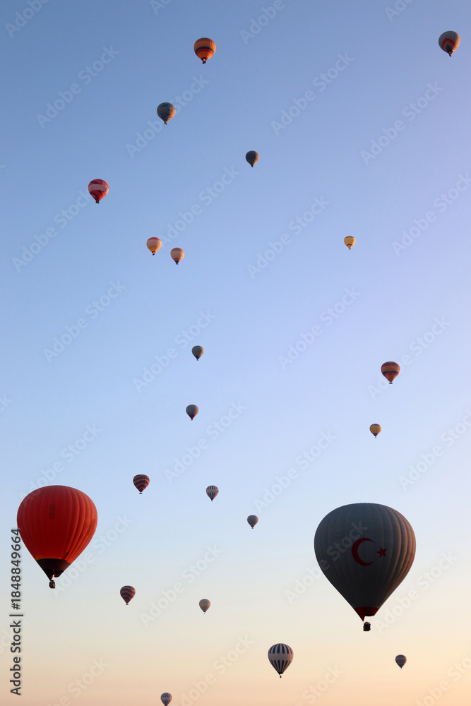 Naklejka premium Hot air balloons flying through the sky