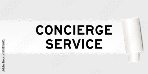 Ripped gray paper background that have word concierge service under torn part