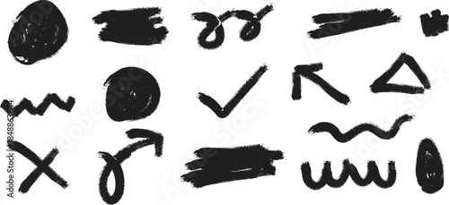 A collection of 15 abstract black brushstroke symbols and marks on a white background