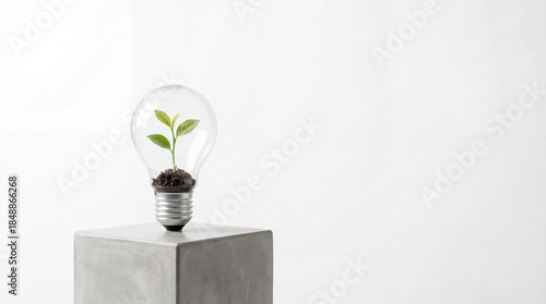 Strategic Green Investment Concept with Eco Light Bulb and Small Sprout on Premium Pedestal