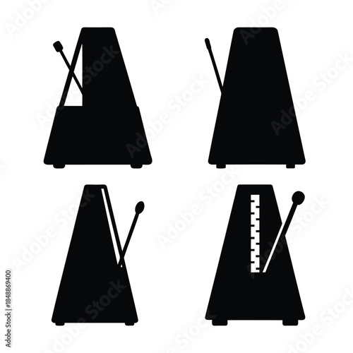 Set of four black metronome silhouettes for musical rhythm