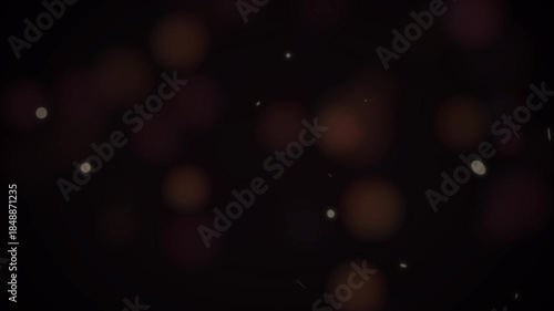 Abstract Bokeh Night Sky: An artistic photograph captures a mesmerizing display of soft, out-of-focus light orbs against a deep, dark backdrop. The image evokes a sense of mystery and serenity. 