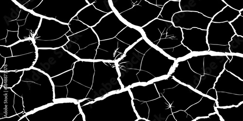 Abstract black and white cracked earth texture showing dry, fractured ground patterns. High-contrast natural surface background symbolizing drought, climate change, arid land, and environmental stress