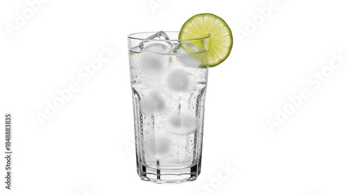 Isolated glass of water filled with ice cubes and slice of lime against neutral backdrop