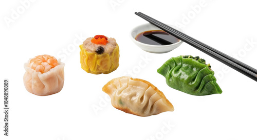 Assortment of various steamed and fried Asian dumplings with soy sauce and chopsticks isolated on white background