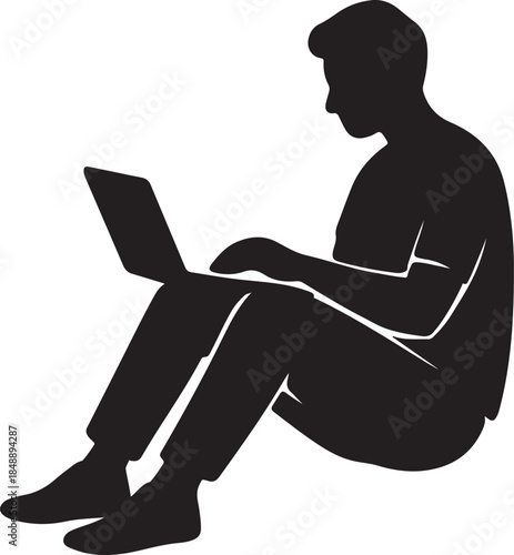 Silhouette of a man sitting with a laptop computer on his lap