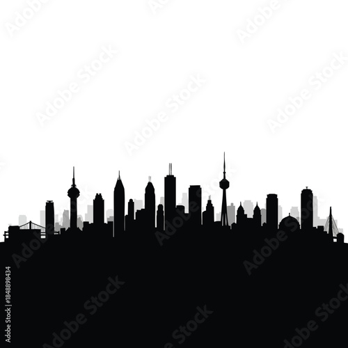 Silhouette of a city skyline with various high-rise buildings and a tower