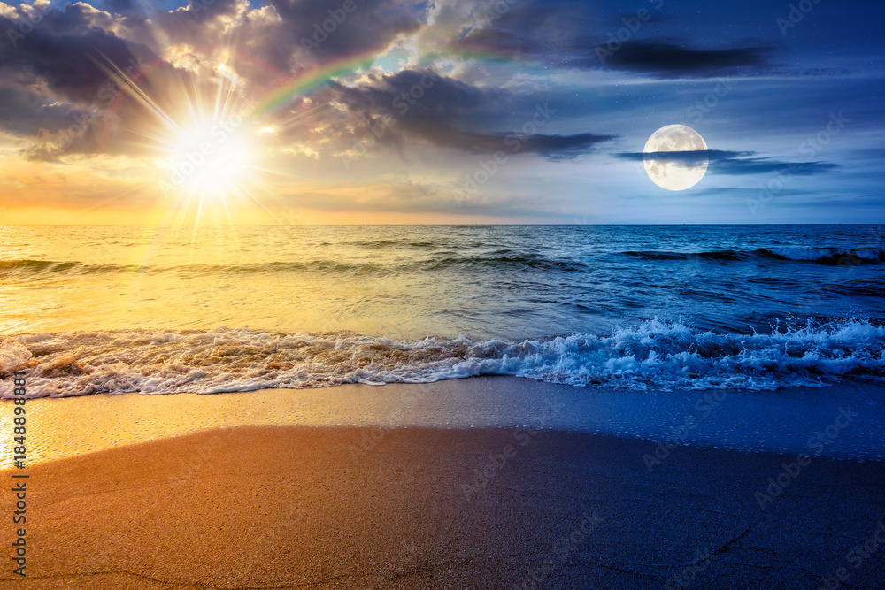 Obraz premium sand beach at the sea for summer solstice vacation. day and night time change concept. beautiful sunrise at perfect coast with calm waves, sun and moon. landscape for duality and transition template