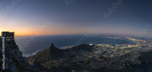 The panorama of cable car at the top of table mountain with twilight sky 
