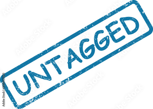 Blue rectangular rubber stamp impression clearly displays the significant word UNTAGGED on a white surface