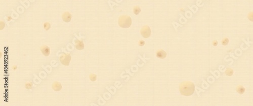 close up of cheese on wooden board