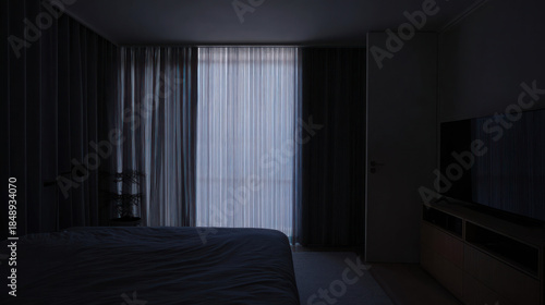 Dimly lit room interior with closed curtains