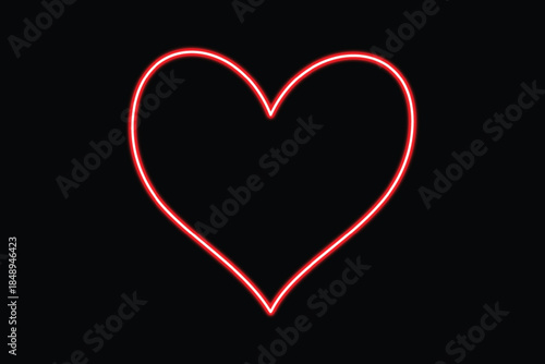 Glowing red neon heart illuminating a dark background with vibrant passion