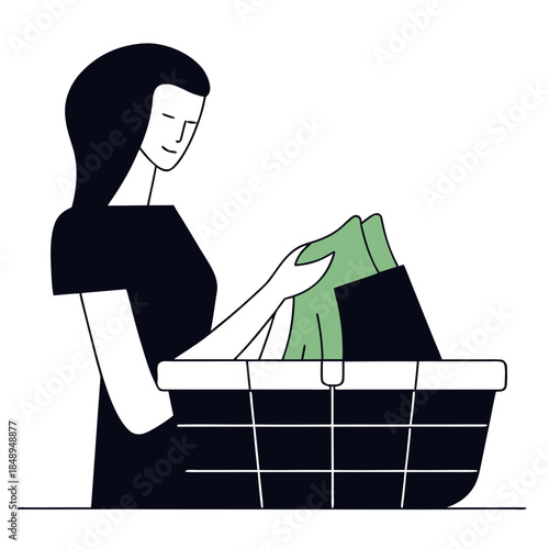 Woman happily folding laundry in a basket in a cozy domestic environment
