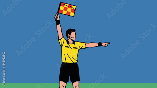 Soccer assistant referee holding a flag and pointing on a green field under a blue sky.