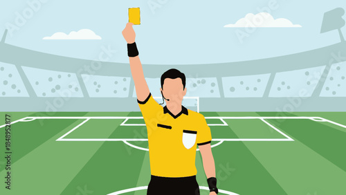 Stern football referee showing a yellow card on a green stadium field, indicating a foul.
