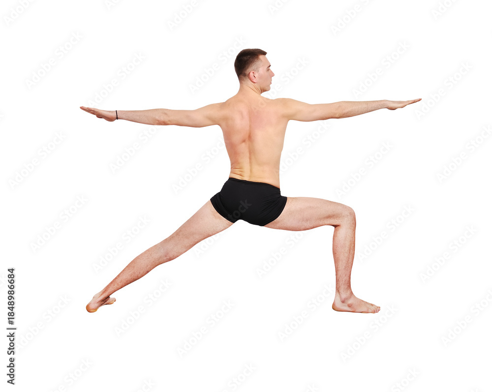 Obraz premium A muscular man doing a yoga asana.