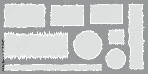 A set of torn paper pieces in different shapes and sizes on a gray background