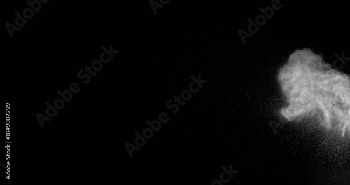 Super slow motion dust particle explosion captured at 500 fps with a high-speed camera. Expanding cloud of fine powder and debris, isolated on black background. Ideal as realistic VFX overlay.