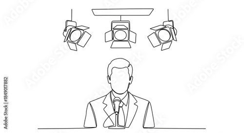 News anchor speaking into a microphone under studio lights  