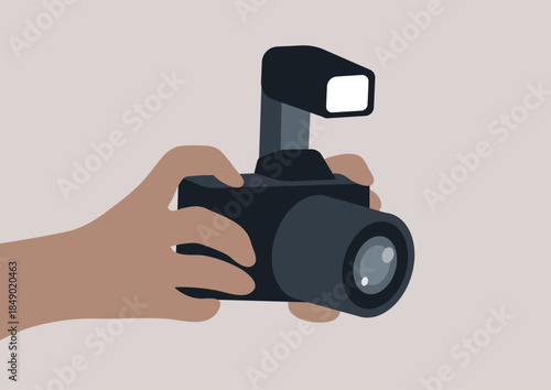 Hands gripping a camera lens, poised to capture stunning scenes, The creative energy flows as moments await their vivid retelling, focusing on artistry and expression in every shot.