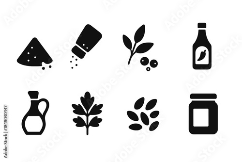 Cooking and spice silhouette icon set: salt, pepper, herbs, and sauce silhouettes