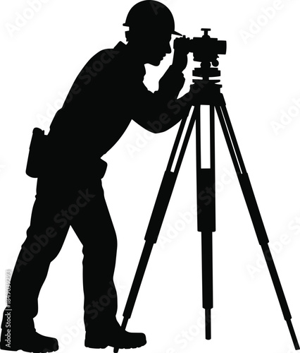 Silhouette of a surveyor using a theodolite on a tripod surveying engineer