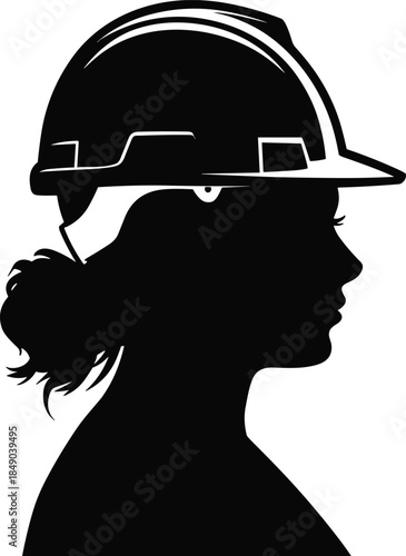 Silhouette profile of a woman wearing a hard hat female worker