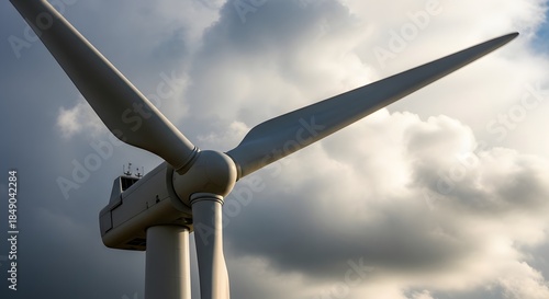 Majestic Wind Turbine against Cloudy Sky in Renewable Energy and Sustainable Power Generation Scene