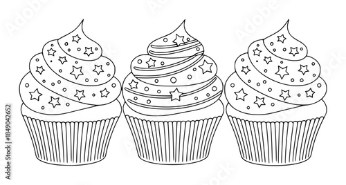 Cupcakes with swirled frosting and star decorations stars
