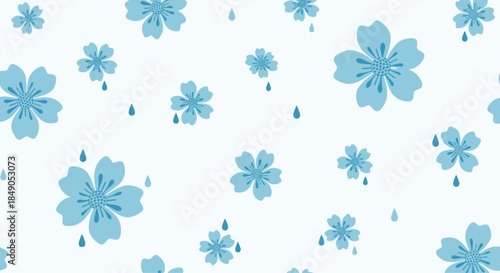 Blue floral pattern with scattered blossoms and soft petals on a pale background creating a calm decorative motif suitable for spring and summer designs.