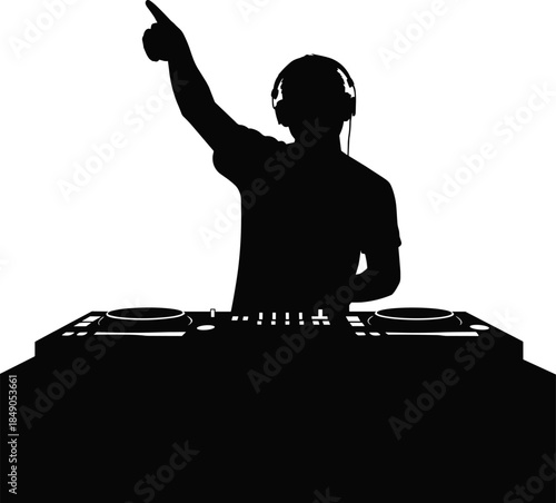 Black Silhouette of a Professional DJ Wearing Headphones and Raising One Arm While Performing at a Nightclub Party Event