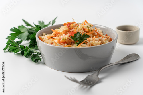 Fresh Coleslaw Salad in Gray Bowl on White Background, Healthy Food Concept