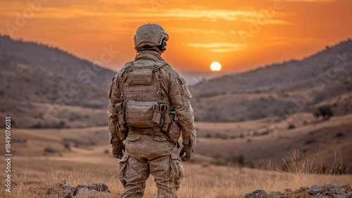 Soldier uniform with helmet and tactical gear standing sunset landscape mountain field outdoor, military protection and security arid desert, solitude and calm evening patrol mission, rugged terrain
