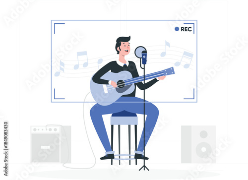 Man playing acoustic guitar and singing into microphone in front of recording screen musician