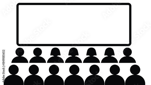 A group of people gathered in front of a blank presentation screen