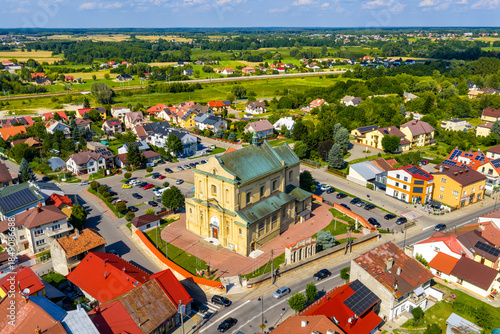 Aerial view of XVII century Birth of Blessed Virgin Mary parish church in historic quarter of Sedziszow Malopolski town in Podkarpacie region of Lesser Poland
