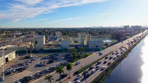 Industrial district of Hialeah Miami Florida by the Miami River and traffic during rush hour
