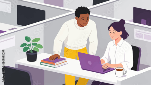 Office workers collaborating on laptop