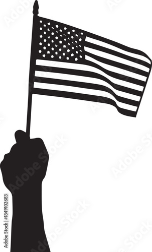 Silhouette of a fist holding the american flag aloft