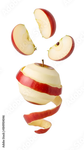 Red apple peeled and sliced floating on a white background, fresh fruit concept perfect for healthy eating and nutrition