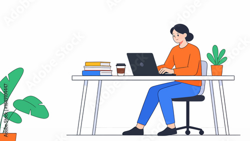Person working on laptop at desk