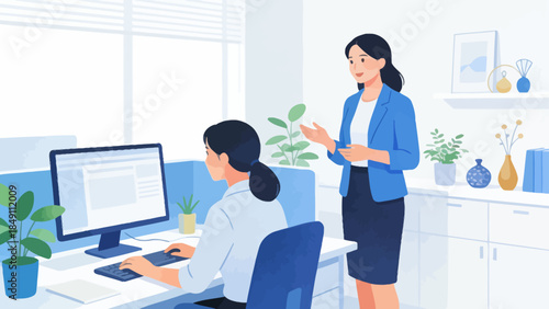 Office workers collaborating at desk