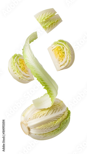 Sliced napa cabbage with separated leaves showing fresh green and white layers, isolated on white background, perfect for healthy cooking and recipes