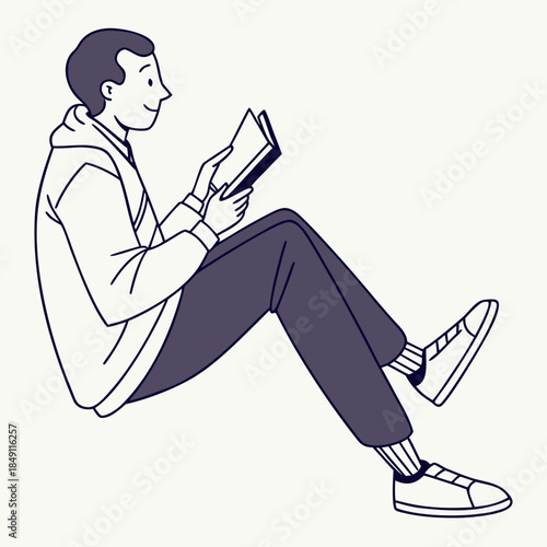 Young man reading book