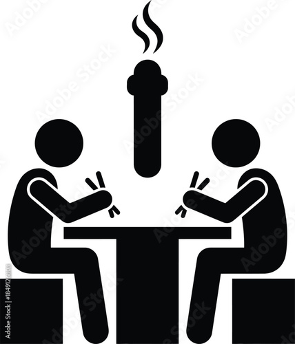 Two people enjoying a hot meal at a table with chopsticks